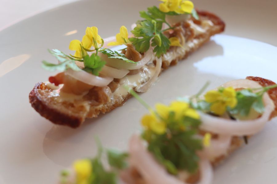 Pickled clam and shallot toast at Marla Singer