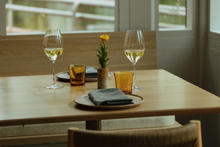 A table setting with wine at Botanic Lodge in Adelaide