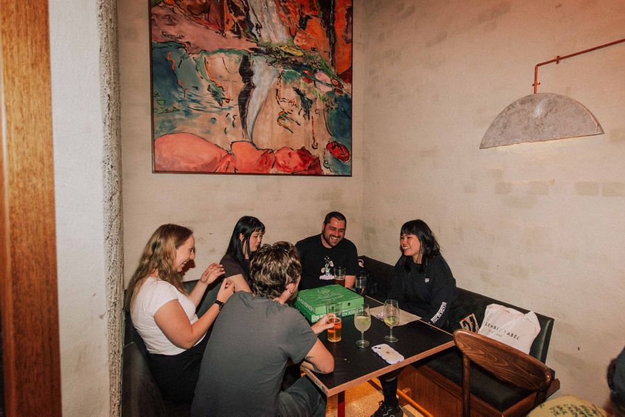 A group enjoying pizza at High Note 