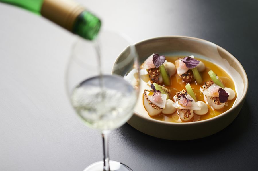 A white wine matched with a seafood dish in the restaurant at Leeuwin Estate