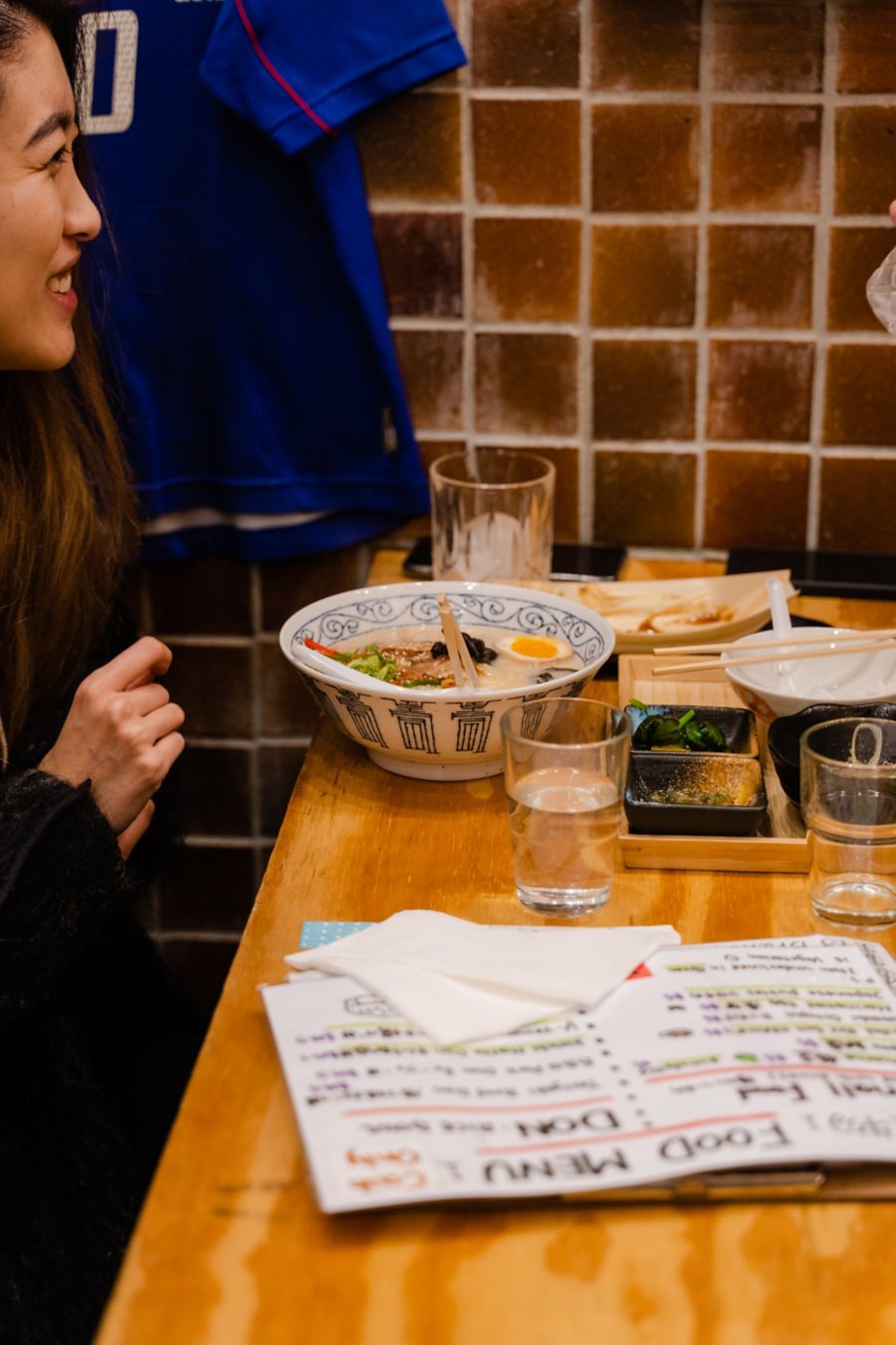 image of food menu and a dish at Tachinomi