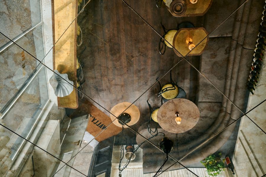 Wonderful interiors at Wally’s include a mirrored ceiling