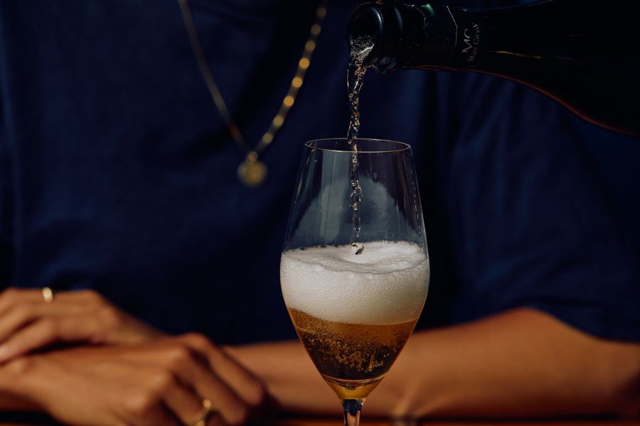 Pouring Champagne at Patsy's in Melbourne