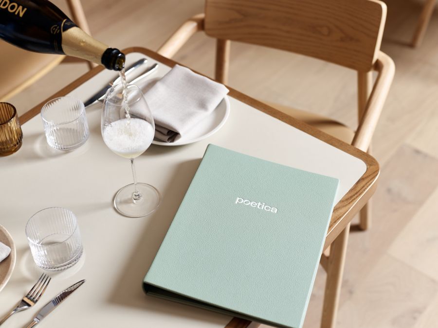 Pouring sparkling wine at North Sydney's Poetica