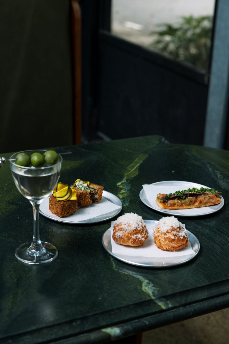 Various snacks with a Martini at Bar Copains