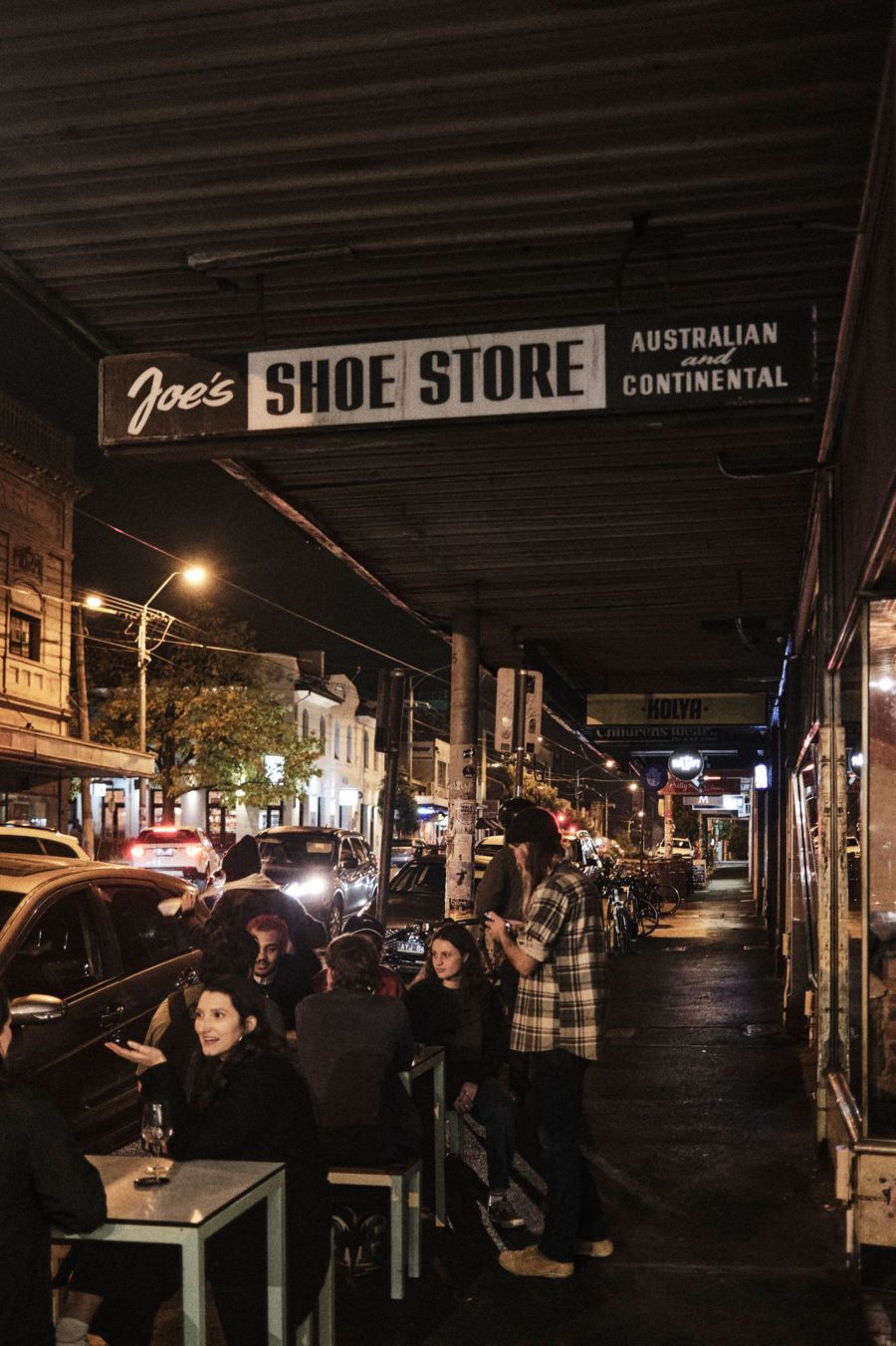 Busy tables on the street outside Joe's Shoe Store, Melbourne