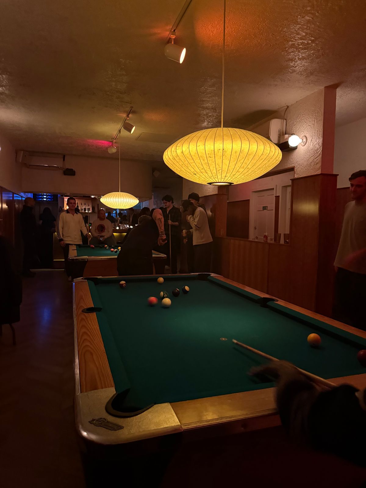 A pool table NYC bar Twins Lounge  