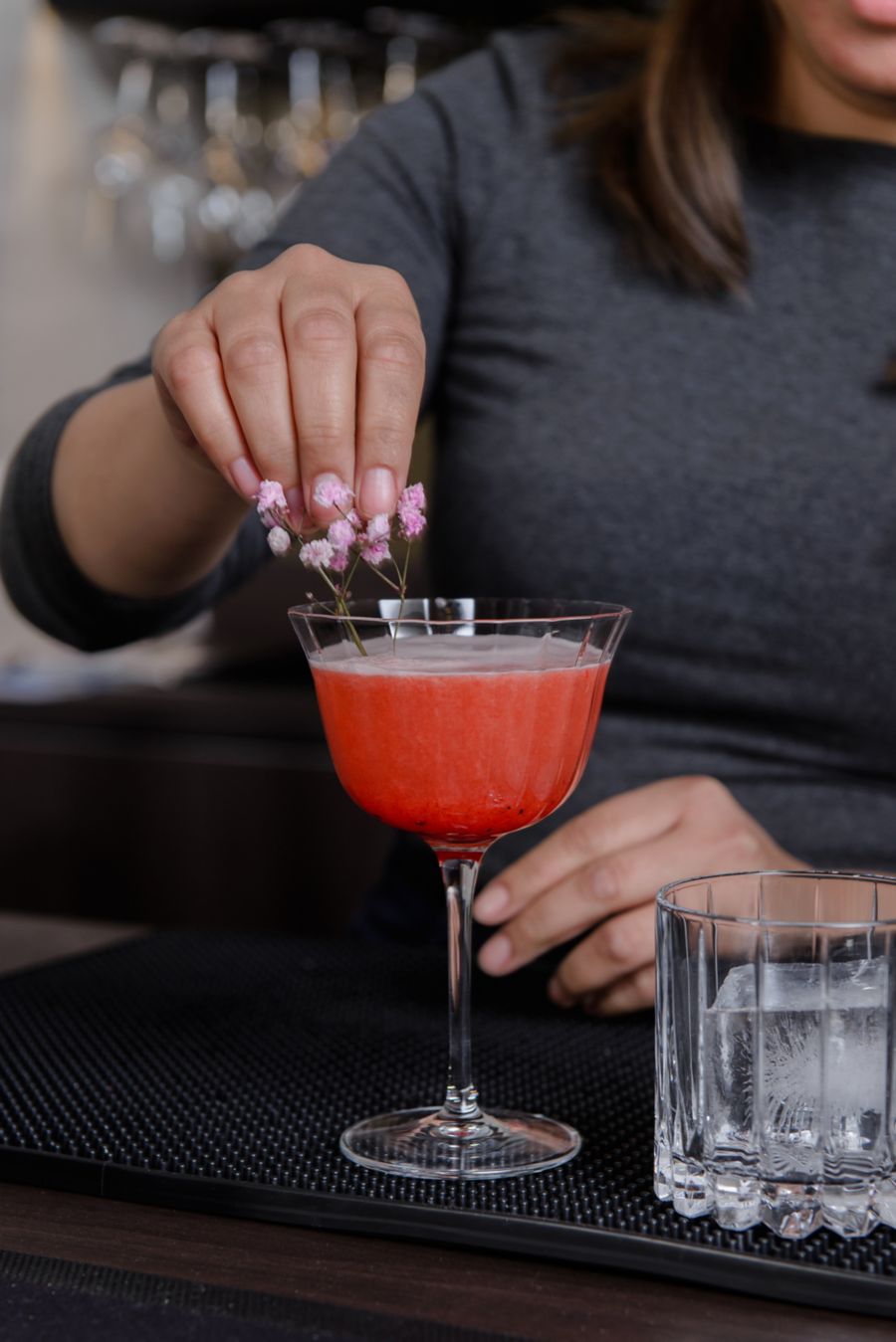 People standing near bar area at Gracie