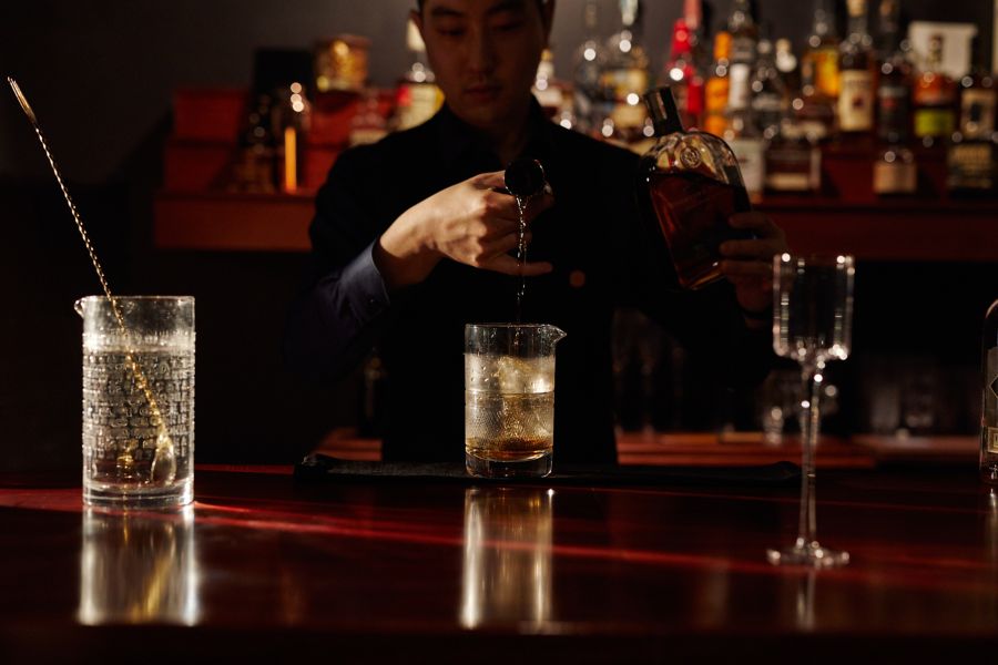 Serving drinks at Bar Peripheral in Adelaide