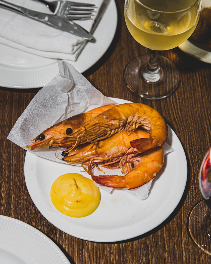 Smoked tiger prawns and a glass of wine at Bar Suze