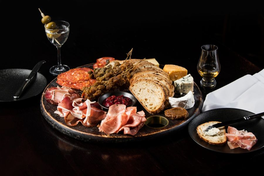 Cocktail glasses and bottles at Eau De Vie Melbourne