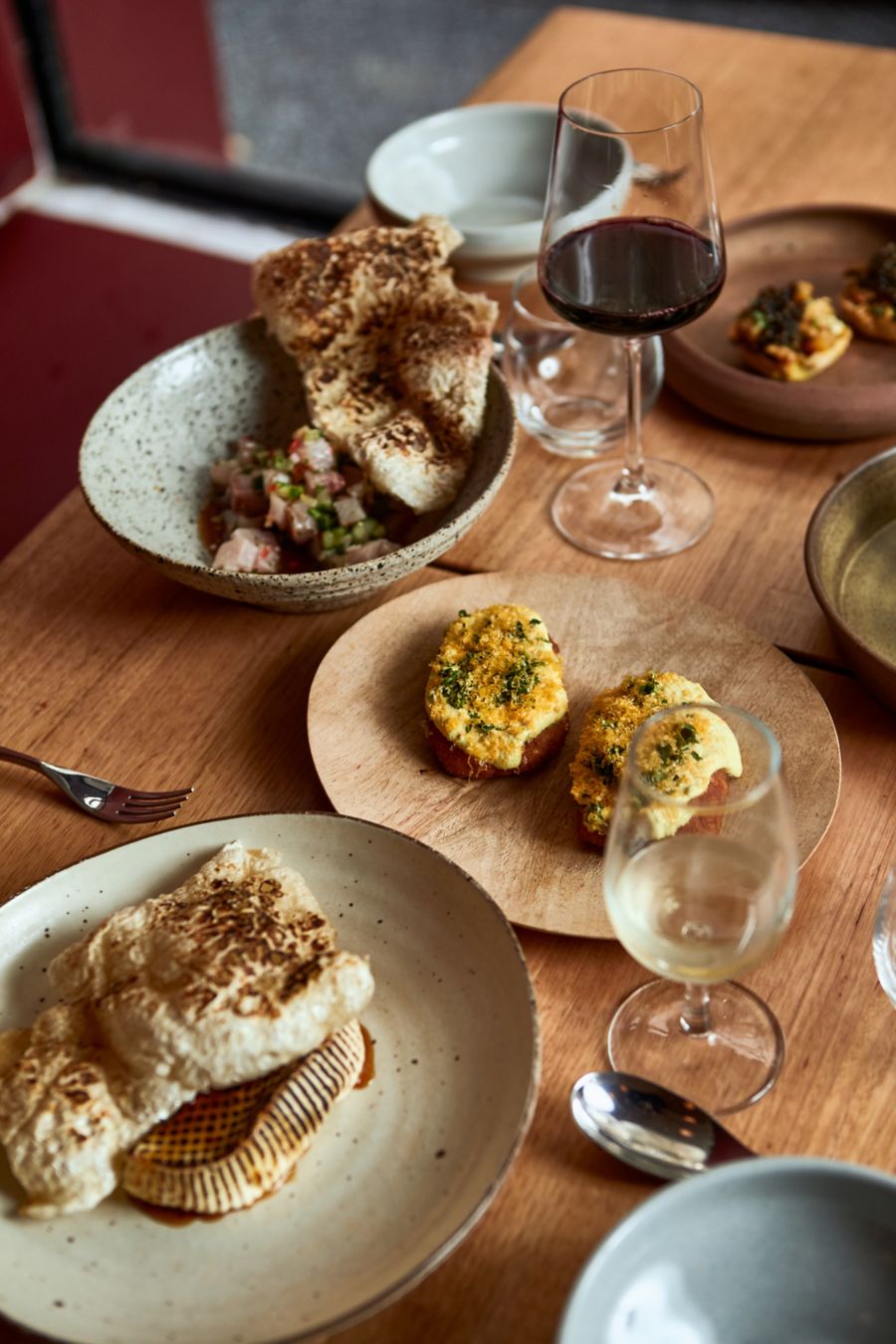 A glass of Purple colour drink at Serai