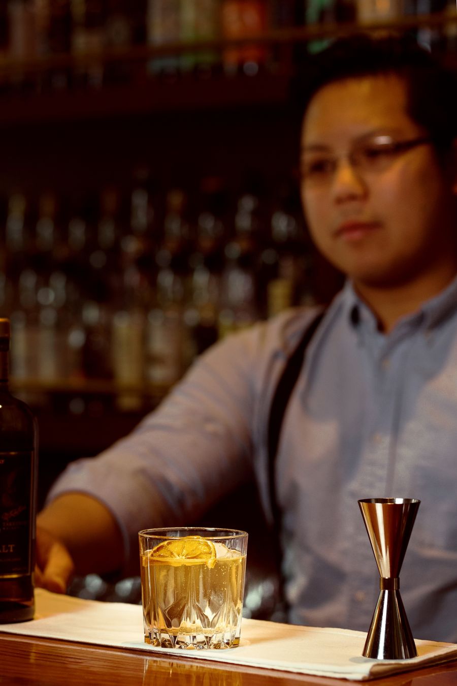 Bartender with cocktail tray