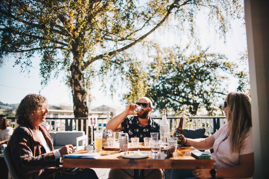 image of group of people sitting outside