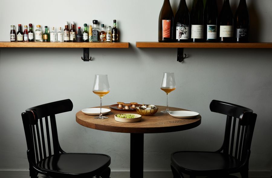 A couple of glasses of wine with food at Bar Liberty