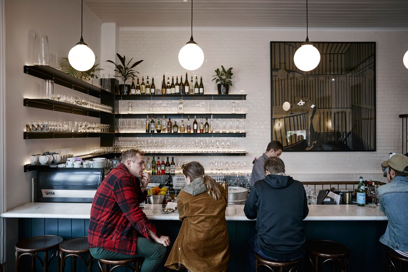 Sitting at the counter of Melbourne's much-loved Carlton Wine Room