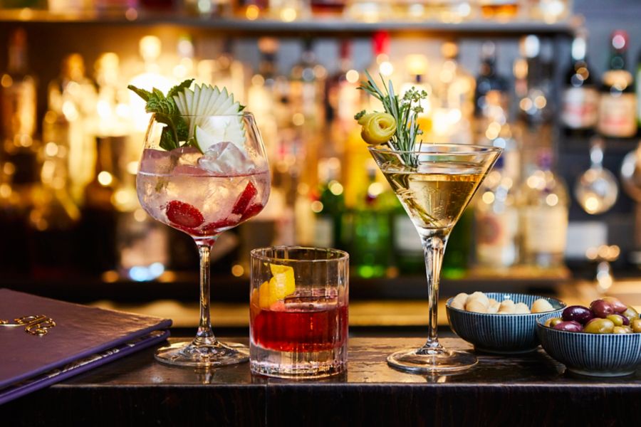 image of 3 fancy cocktails on table