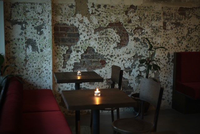 Shabooh Shoobah Seating Around The Sizeable Timber and Marble Bar in Melbourne