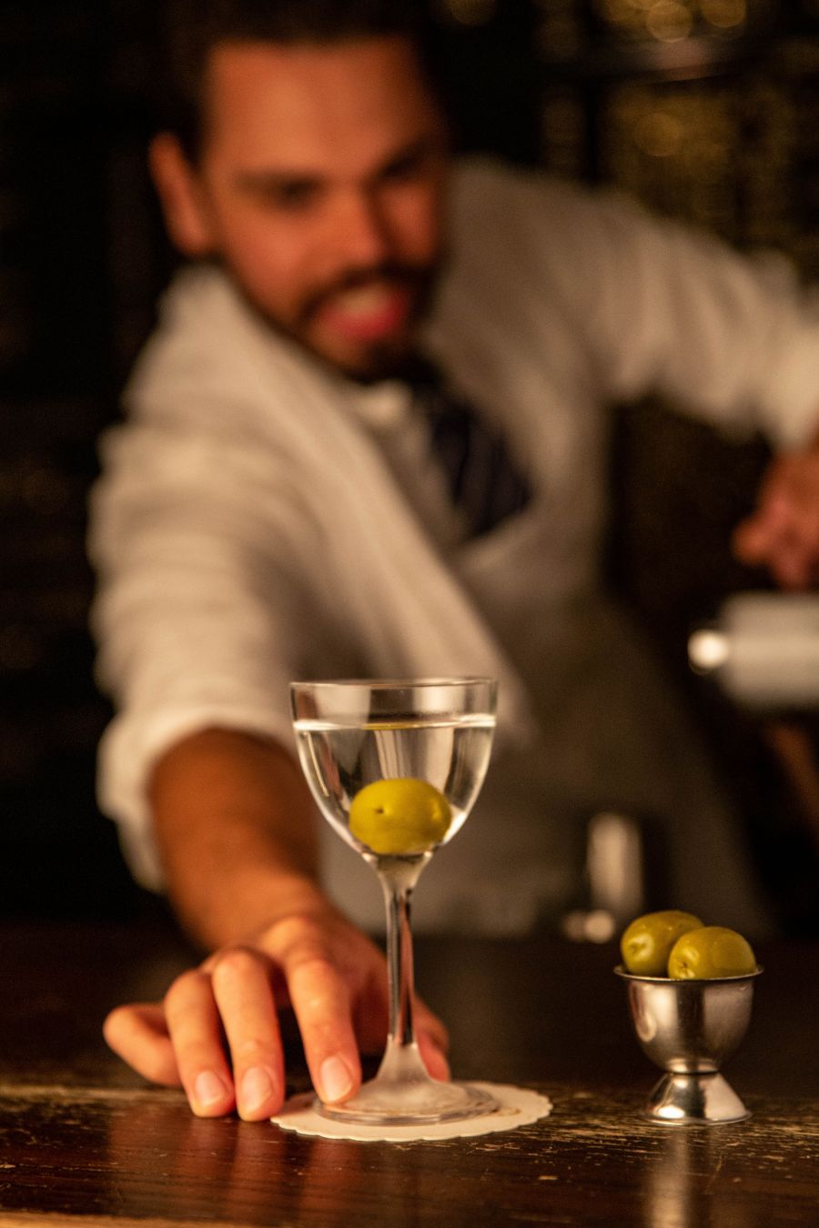 Bartender serving a cocktail