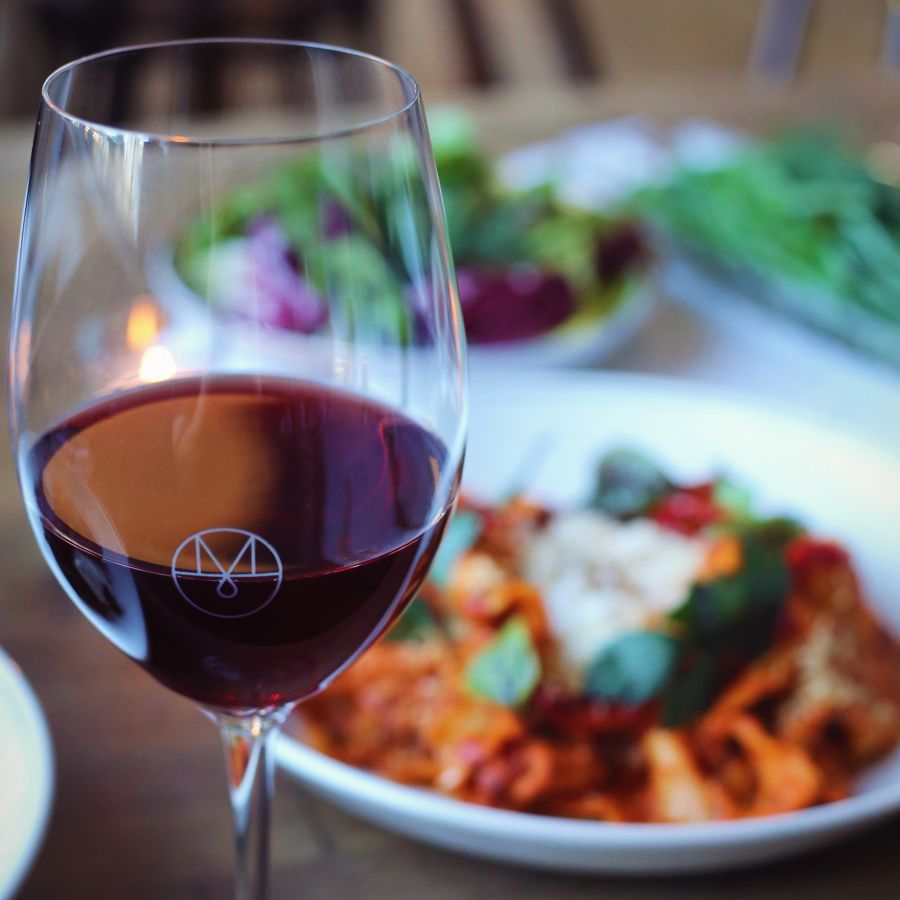 Tasty Snacks and Spanish Ham With A Glass of Wine at Maeve Brisbane