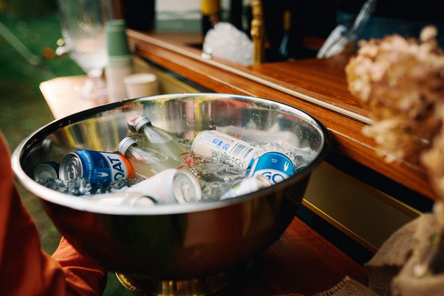 An ice bucket of drinks at the wedding 