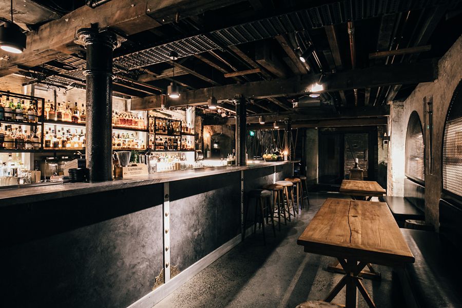 Image of Lady bar tender at Mjolner