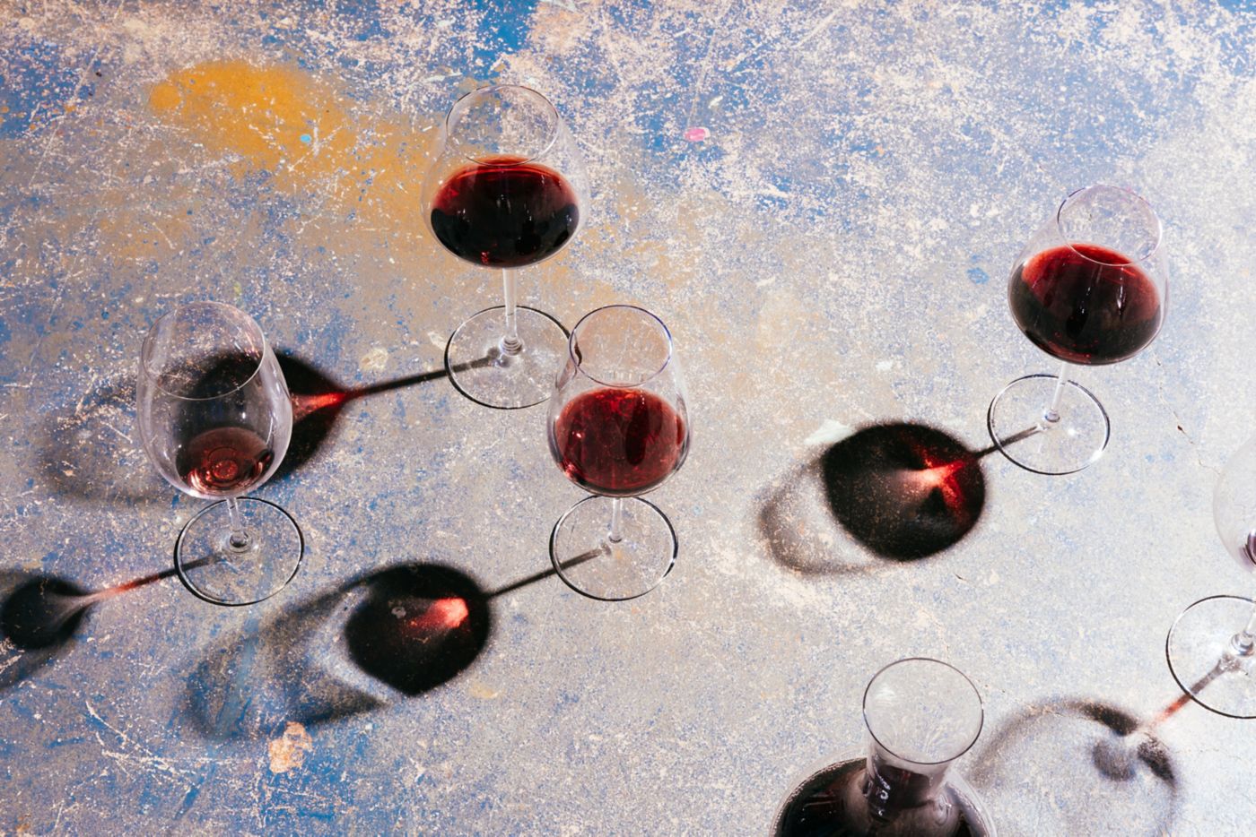 Glasses of red wine in the sun