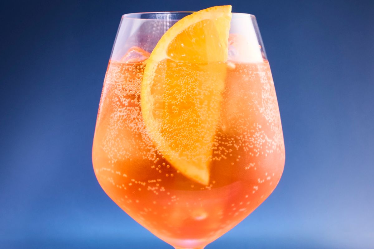 The classic Aperol Spritz, garnished with an orange slice