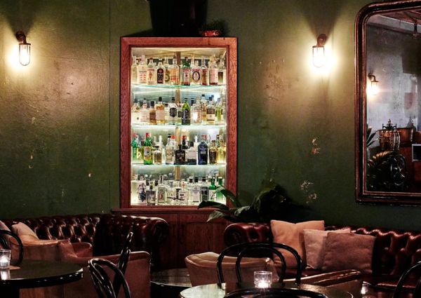  A grooming shop for men and a drink station with a collection of over 90 gins from around the world. 

