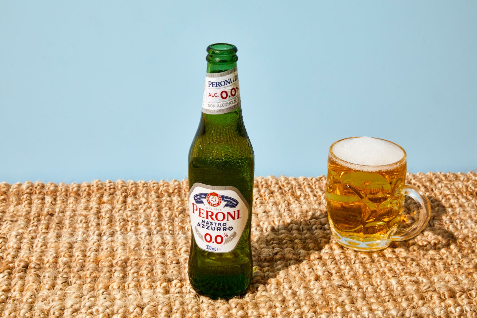 A bottle of  Peroni Nastro Azzurro 0.0%