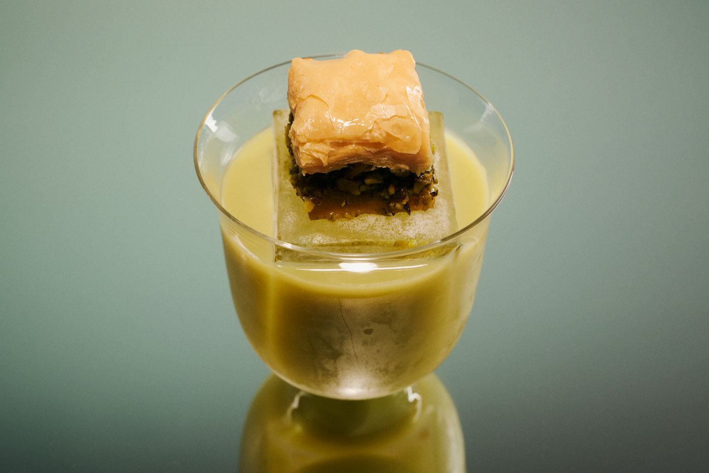 A Baklava Old Fashioned with a piece of baklava on top 