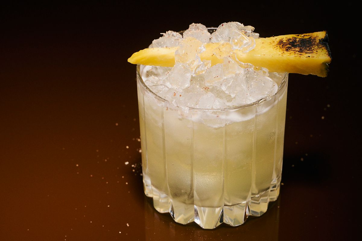 The Earl's Vacation is garnished with pineapple sprinkled with nutmeg