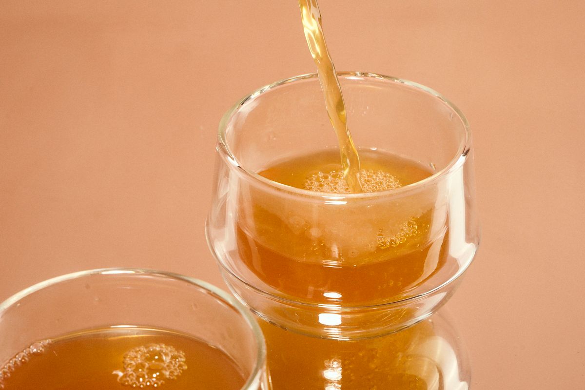 Pouring warm and spiced Mulled Cider 