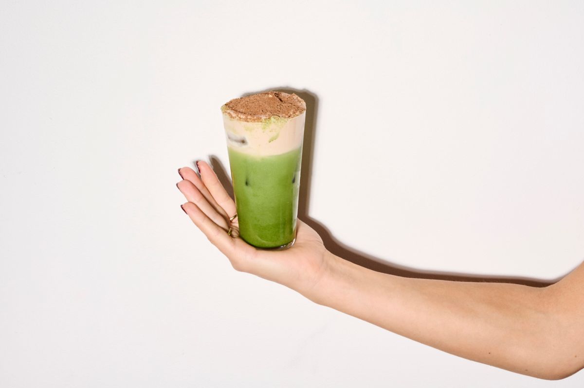 Holding a a creamy, nutty and sweet Alcoholic Malt Matcha