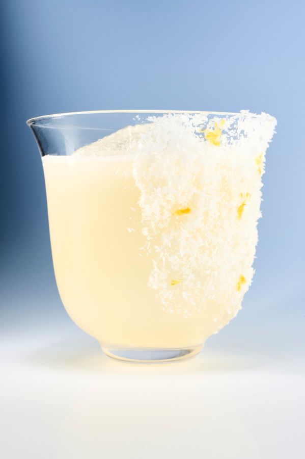 A coconut and salt garnish completes the Coconut Limoncello Margarita