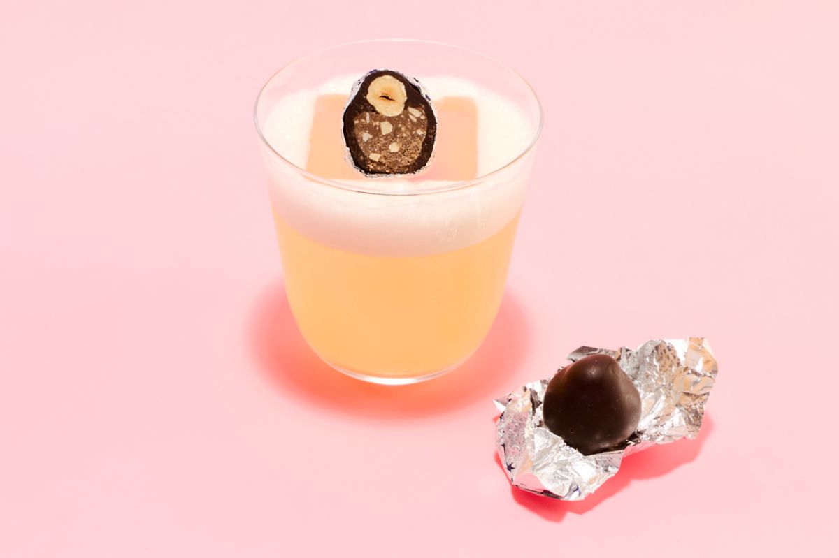 The Hazelnut Sour is garnished with a Baci kiss 