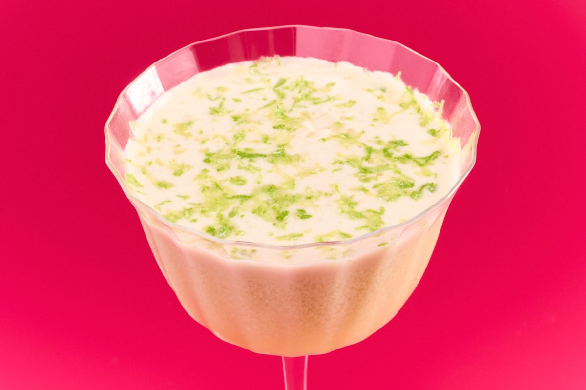 Lime zest on the top of the Hot Honey Coco Daiquiri cocktail