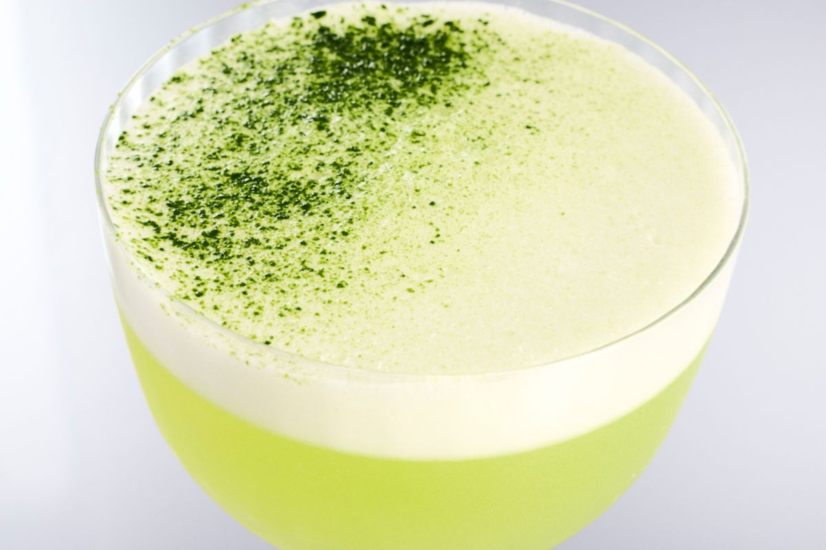The frothy top of the Matcha Sour, sprinkled with matcha powder 